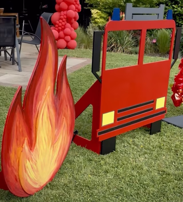 Hand painted Plywood fire flame prop showing detailed brush painting techniques for event prop design