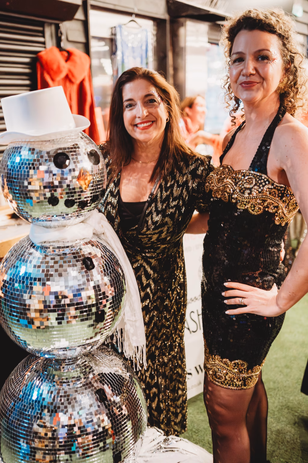 Disco ball snowman decoration with mirrored spheres, top hat and scarf, styled for winter weddings and Christmas party décor hire in Norfolk by Williams & Rose.