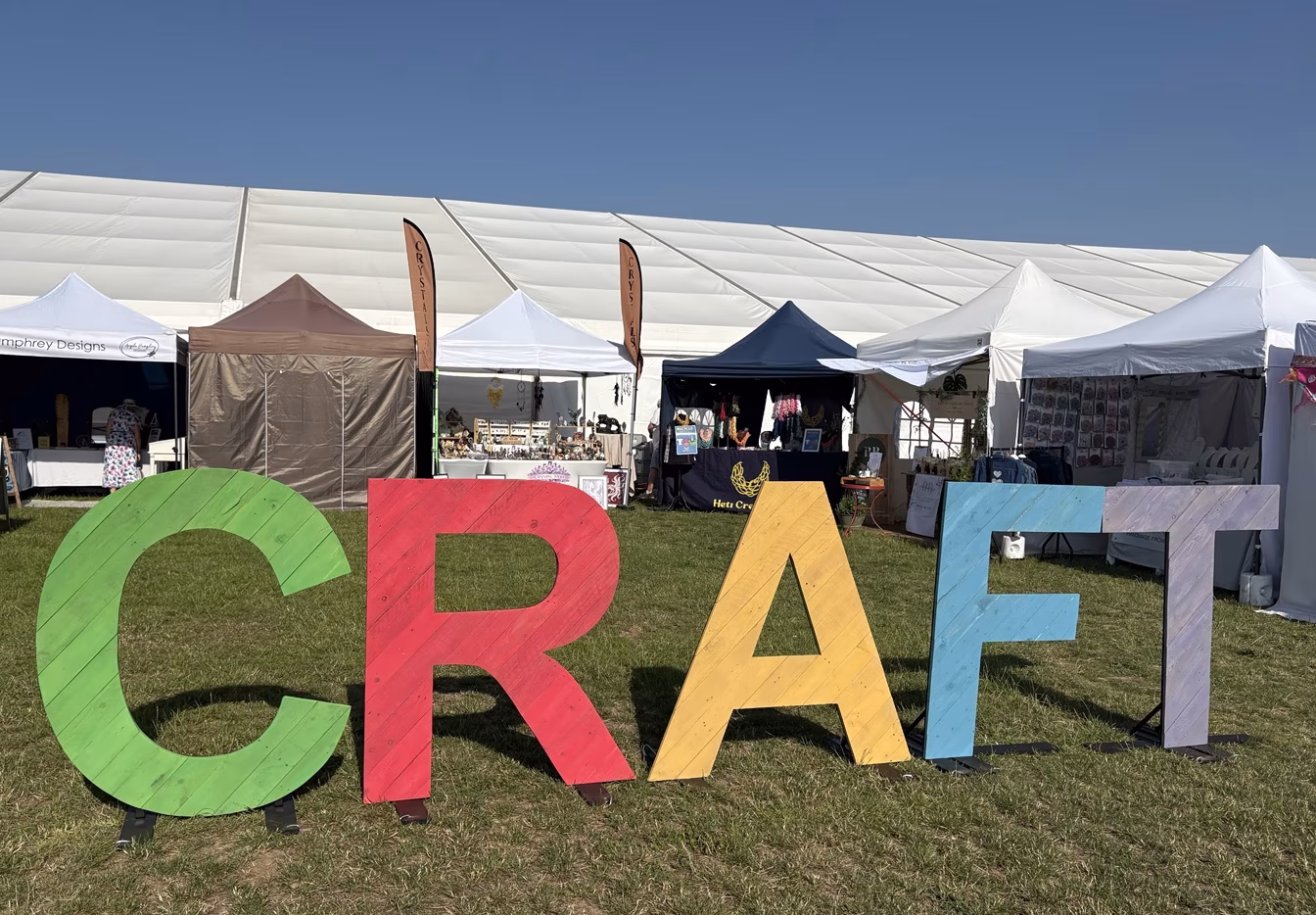 Large handcrafted CRAFT letters designed and built by Williams & Rose for the Royal Norfolk Show Craft Area in Norfolk.