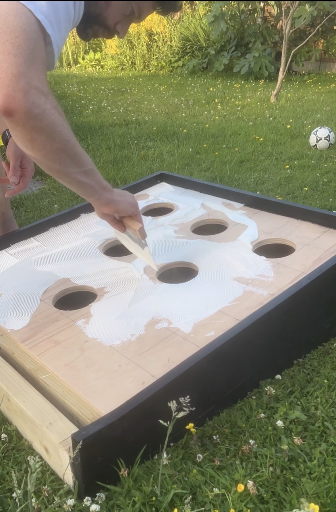 Handcrafted Battle Putt garden game in play at an outdoor event, available to hire for weddings, parties and corporate events across Norfolk.