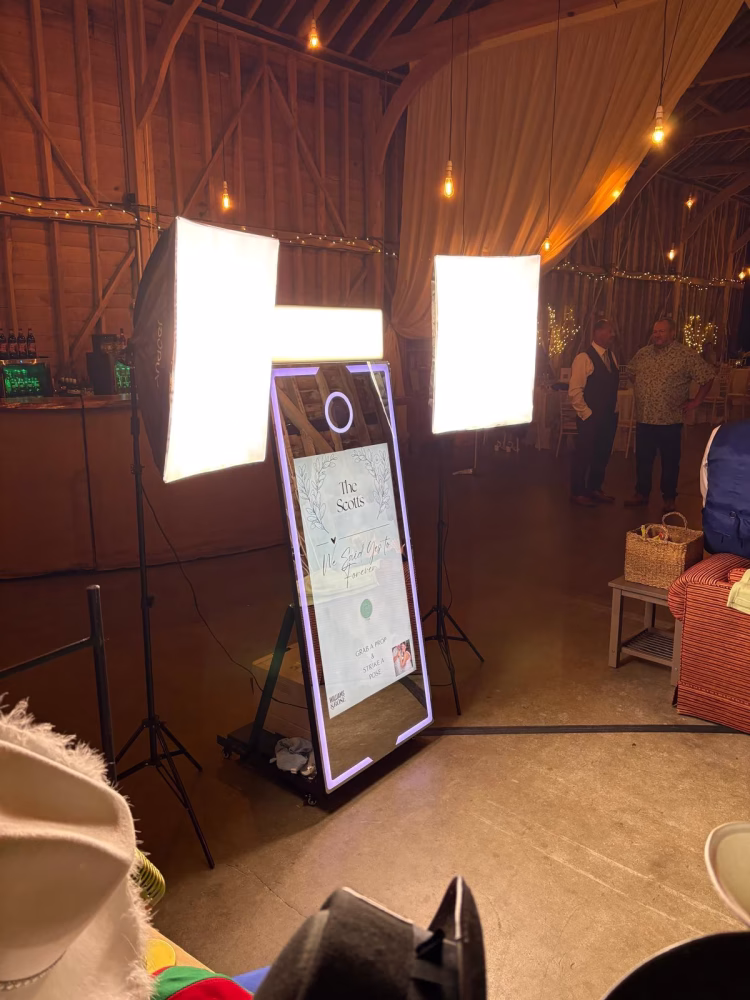 Magic Mirror Photo Booth set up for a wedding at Childerley Hall in Cambridgeshire with additional free standing softbox lighting